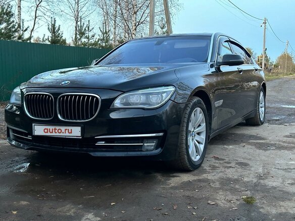 2012 BMW 7 серии 750Li xDrive V (F01/F02/F04) Рестайлинг, чёрный - вид 1