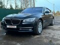 2012 BMW 7 серии 750Li xDrive V (F01/F02/F04) Рестайлинг, чёрный - вид 1