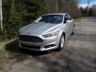 2015 Ford Fusion (North America) II, серебристый, 1200000 рублей, вид 3