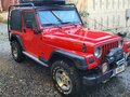 1997 Jeep Wrangler II (TJ), пурпурный, 1800000 рублей - вид 2