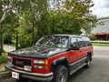 1997 GMC Suburban, красный, 1999999 рублей - вид 1