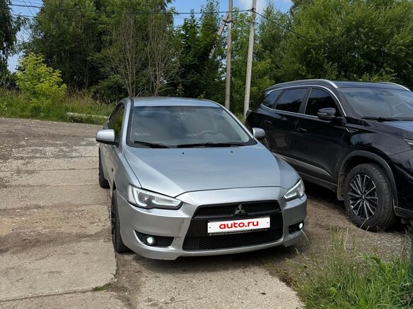 2007 Mitsubishi Lancer X, серебристый - вид 1