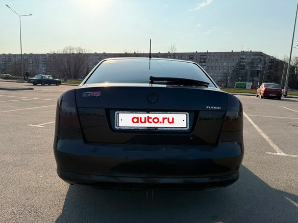 2012 Skoda Octavia II (A5) Рестайлинг, чёрный, 750000 рублей - вид 2