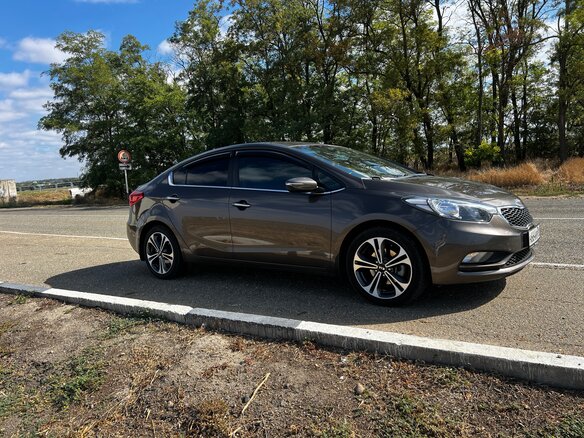2016 Kia Cerato III Рестайлинг (Classic), коричневый, 1450000 рублей - вид 7