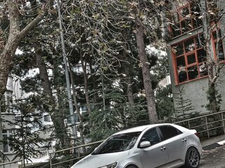 2012 Kia Cerato 6-speed II, белый, 850000 рублей, вид 2