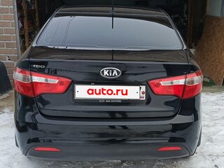 2014 Kia Rio 5-speed III, чёрный, 800000 рублей, вид 5