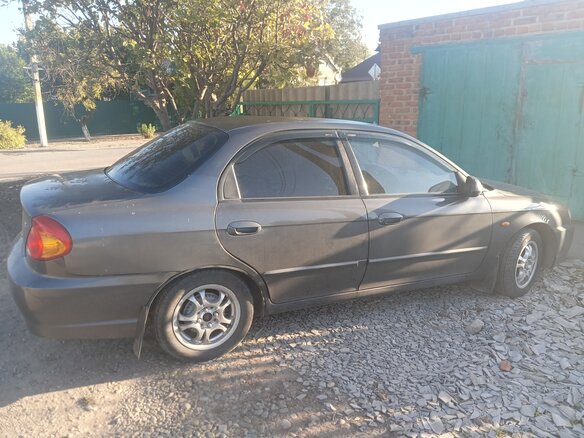 2006 Kia Spectra I Рестайлинг 2, серый, 250000 рублей - вид 1