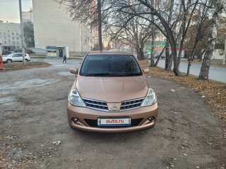 2009 Nissan Tiida I, золотистый, 700000 рублей, вид 1