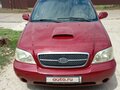 2005 Kia Carnival I Рестайлинг, красный, 550000 рублей