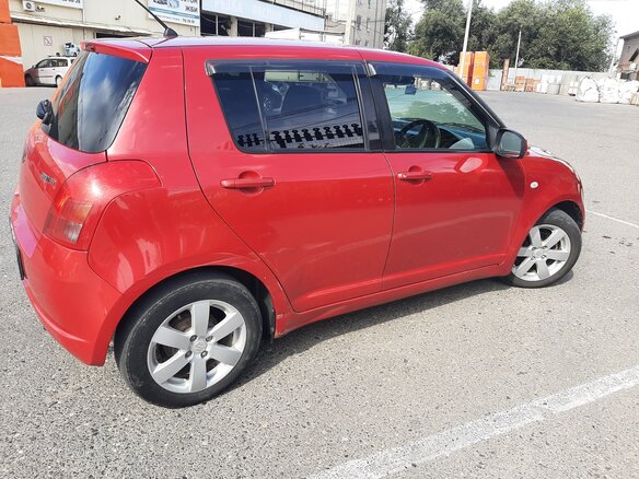 2004 Suzuki Swift III, пурпурный - вид 3