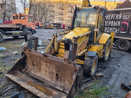 2000 Komatsu WB97R, жёлтый, 2850000 рублей, вид 2