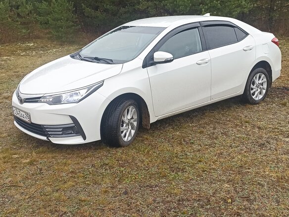 2018 Toyota Corolla XI (E160, E170, E180) Рестайлинг 1, белый, 1750000 рублей - вид 1