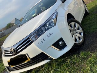 2014 Toyota Corolla XI (E160, E170, E180), белый, 1450000 рублей, вид 5