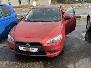 2009 Mitsubishi Lancer X, красный, 650000 рублей, вид 1