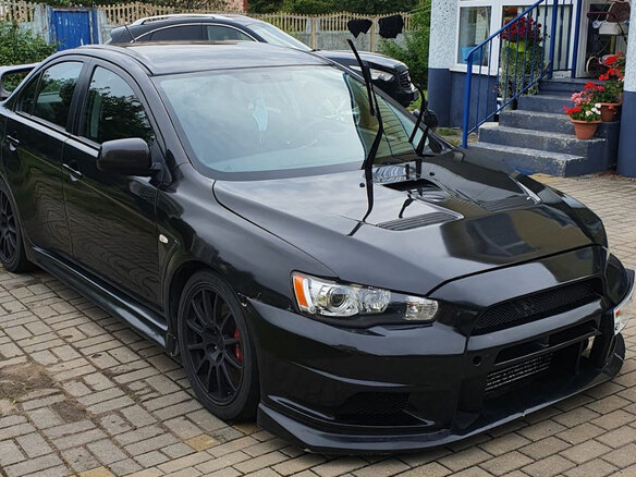 2012 Mitsubishi Lancer Evolution X, чёрный, 1555000 рублей