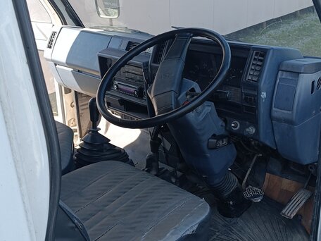 1992 Isuzu Elf (N-series), белый, 650000 рублей, вид 5
