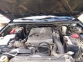 2013 Mitsubishi L200 Easy Select IV Рестайлинг, чёрный, 2100000 рублей - вид 4