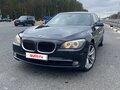 2009 BMW 7 серии 740i V (F01/F02/F04), чёрный, 1690000 рублей