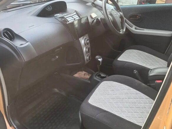 2005 Toyota Vitz II (XP90), оранжевый, 510000 рублей - вид 14