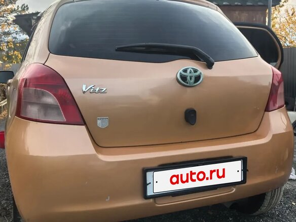 2005 Toyota Vitz II (XP90), оранжевый, 510000 рублей - вид 12