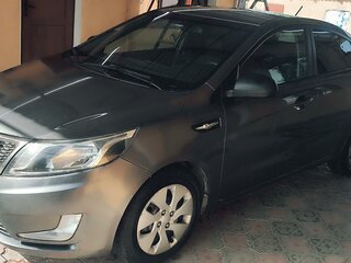 2015 Kia Rio 6-speed III, серый, 1100000 рублей, вид 1