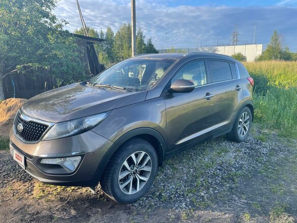 2015 Kia Sportage III Рестайлинг, коричневый, 1250000 рублей - вид 2