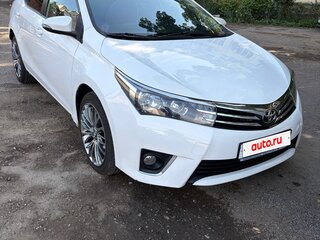 2013 Toyota Corolla XI (E160, E170, E180), белый, 1250000 рублей, вид 2