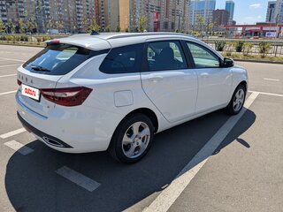 2024 Lada (ВАЗ) Vesta SW I Рестайлинг (NG), белый, 1580000 рублей, вид 4