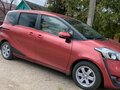 2018 Toyota Sienta II, красный, 1780000 рублей - вид 1