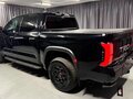 2025 Toyota Tundra CrewMax III, чёрный - вид 4