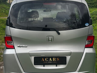 2015 Honda Freed Spike I Рестайлинг 2, серебристый, 800000 рублей, вид 4