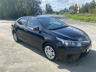 2013 Toyota Corolla XI (E160, E170, E180), чёрный, 1300000 рублей, вид 1