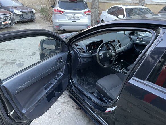 2008 Mitsubishi Lancer X, чёрный, 690000 рублей - вид 9
