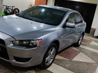 2008 Mitsubishi Lancer X, серебристый, 700000 рублей, вид 1