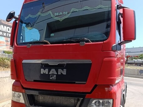 2011 MAN TGX, красный, 3500000 рублей, вид 2