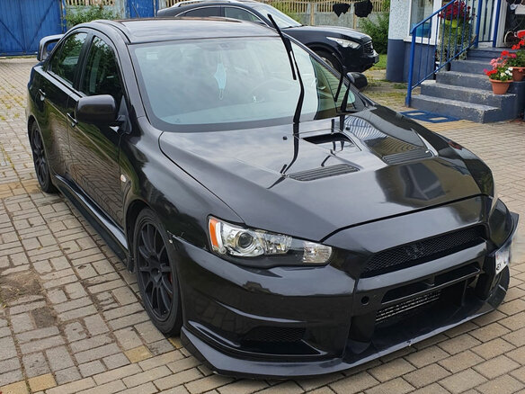 2012 Mitsubishi Lancer Evolution X, чёрный, 1555000 рублей - вид 1