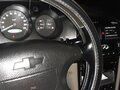 2004 Chevrolet Evanda, чёрный, 450000 рублей - вид 3
