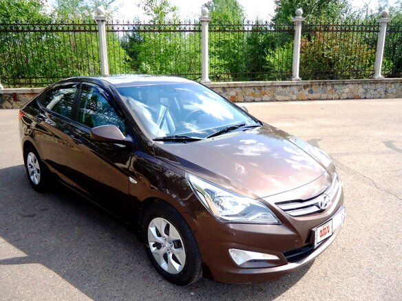 2016 Hyundai Solaris I Рестайлинг, коричневый, 945000 рублей - вид 5