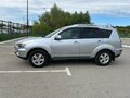 2010 Mitsubishi Outlander II Рестайлинг, серебристый, 1200000 рублей - вид 2