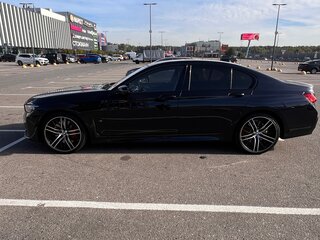 2020 BMW 7 серии 730d xDrive VI (G11/G12) Рестайлинг, чёрный, 5750000 рублей, вид 1