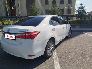 2014 Toyota Corolla XI (E160, E170, E180), белый, 950000 рублей, вид 3