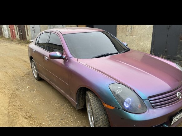 2001 Nissan Skyline XI (V35), фиолетовый, 600000 рублей - вид 4