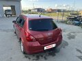2006 Nissan Tiida I, красный - вид 6