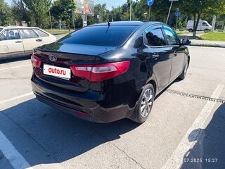 2011 Kia Rio III, чёрный, 575000 рублей, вид 3
