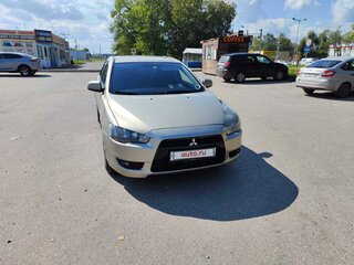 2008 Mitsubishi Lancer X, бежевый, 600000 рублей, вид 1