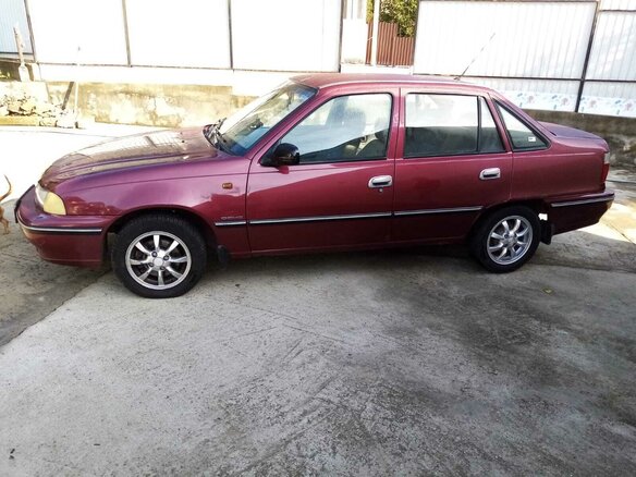 2008 Daewoo Nexia I, пурпурный, 280000 рублей - вид 1