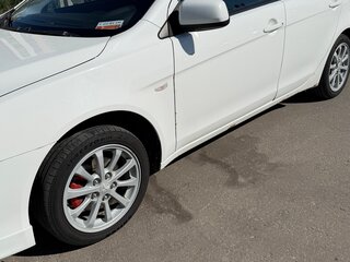 2010 Mitsubishi Lancer X, белый, 649000 рублей, вид 4