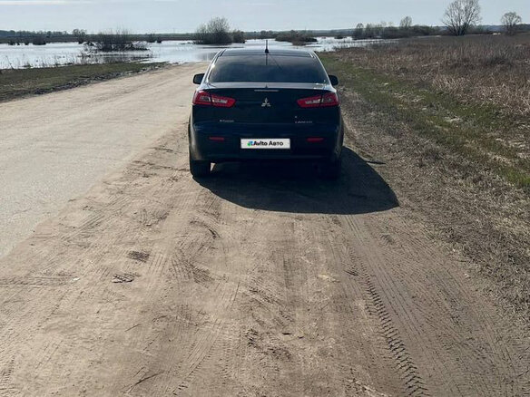 2008 Mitsubishi Lancer X, чёрный, 650000 рублей - вид 37