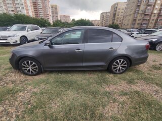 2017 Volkswagen Jetta VI Рестайлинг, серый, 903000 рублей, вид 2