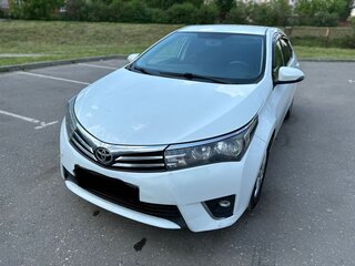 2014 Toyota Corolla XI (E160, E170, E180), белый, 950000 рублей, вид 1